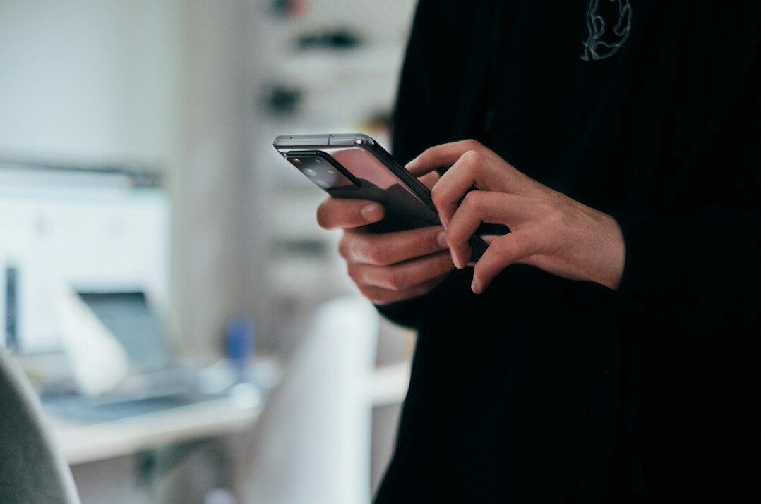 person using insurance app